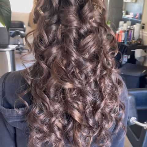 a quinceanera hairstyle for a fancy event
