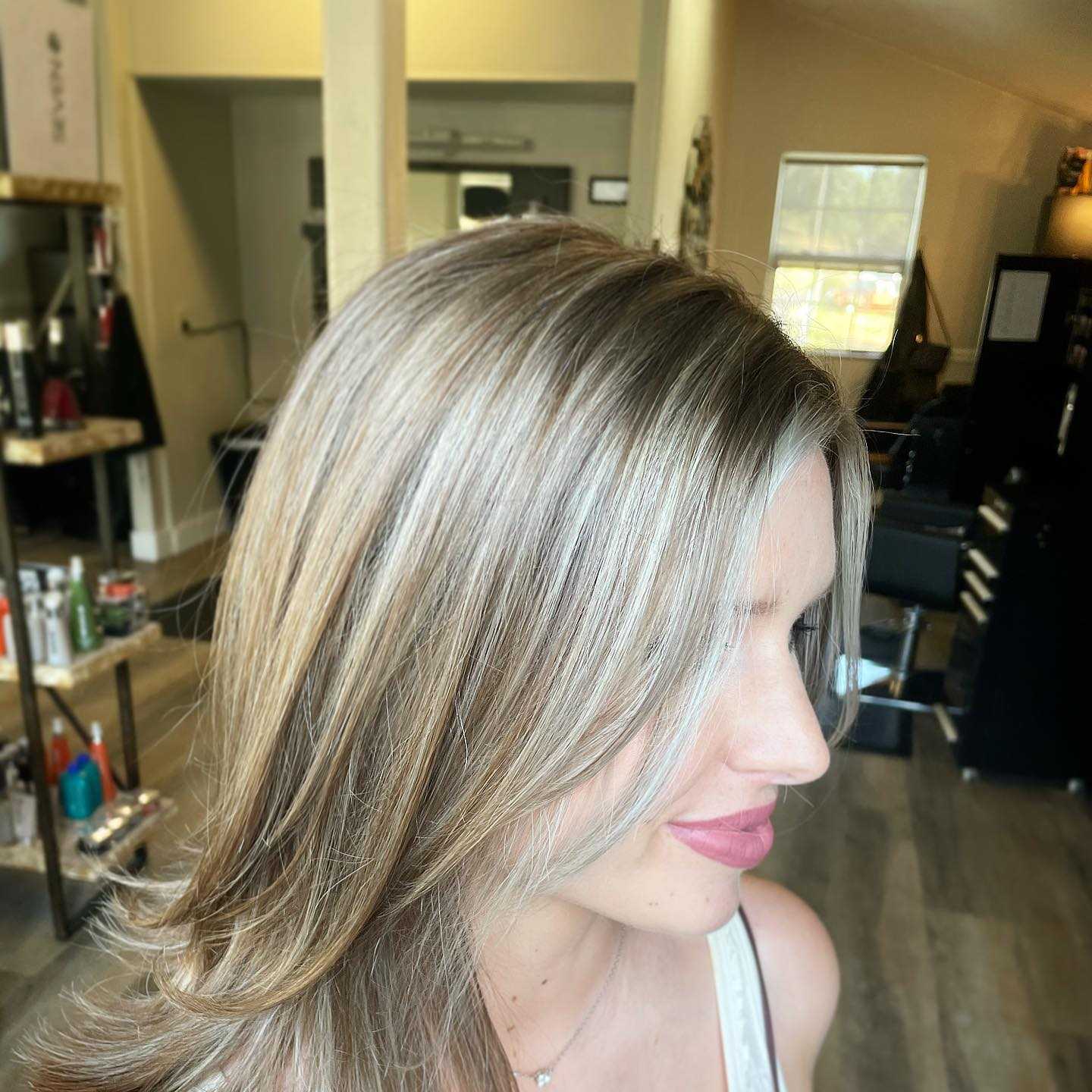 blonde highlights to blonde hair creates depth and vibrancy that stands out